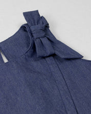 Conjunto blusa chambray azul con moño y falda short rosa oscuro para bebé niña