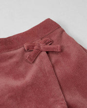 Conjunto blusa chambray azul con moño y falda short rosa oscuro para bebé niña