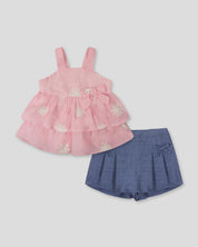 Conjunto blusa rosada de flores bordadas con boleros y falda short azul con moños para bebé niña