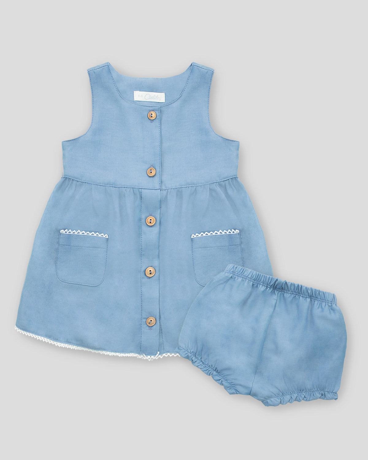 Vestido chambray con detalle de botonadura y panty para bebé niña