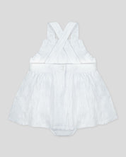 Vestido body blanco de tiras cruzadas para bebé niña