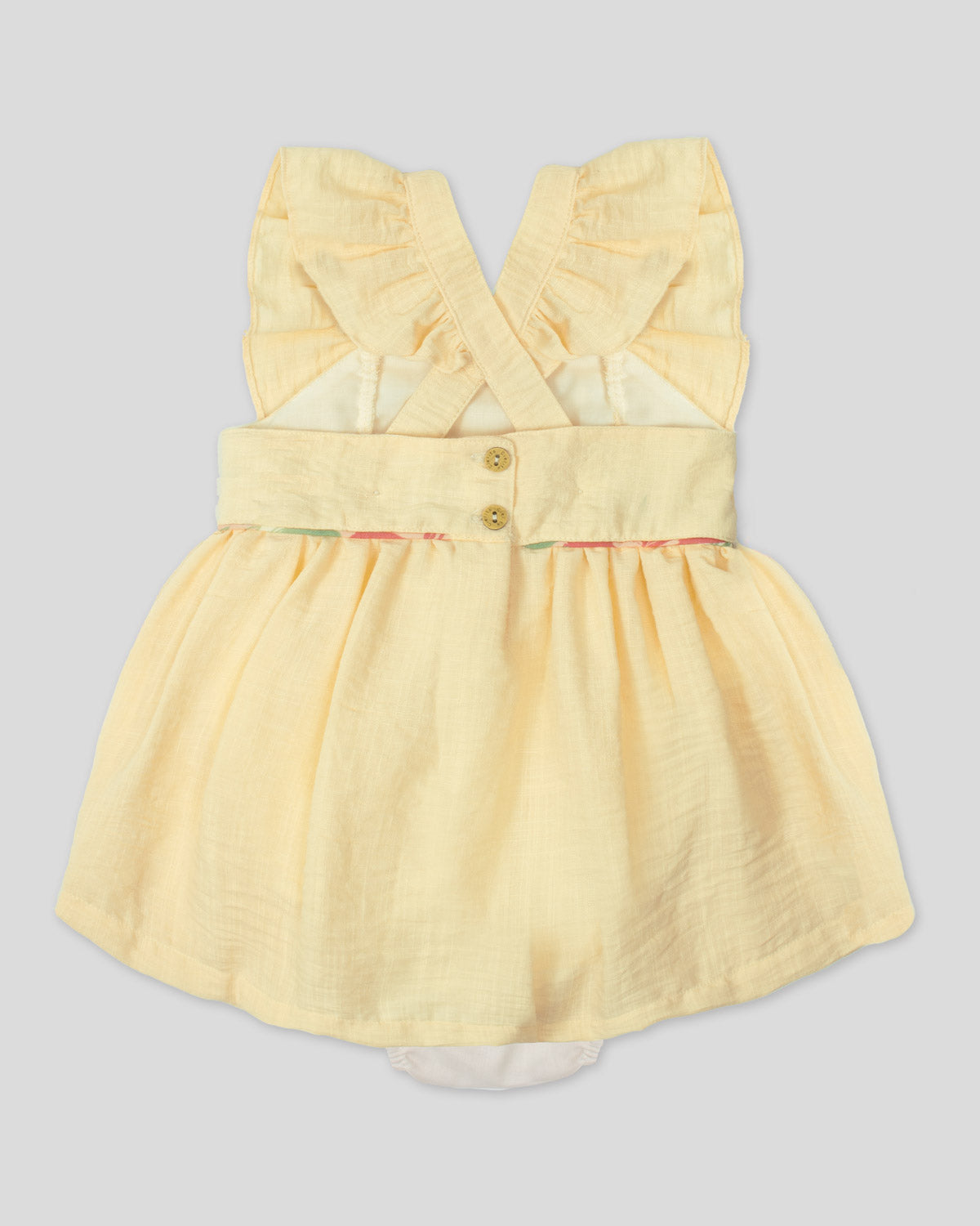 Vestido body amarillo pastel en lino de tiras con bolero y moño estampado para bebé niña