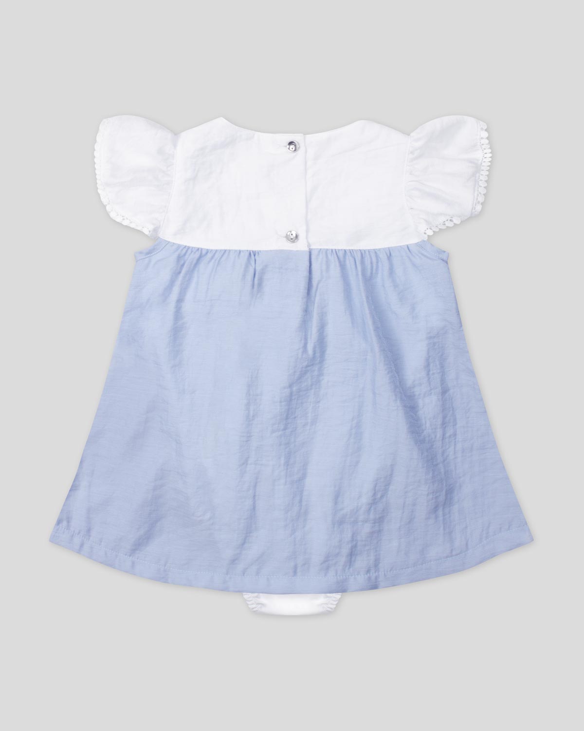 Vestido body en tencel blanco y azul, mangas con detalle de encaje y moño para bebé niña