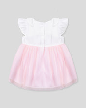 Vestido body en tencel blanco con moñitos y tull plisado rosa para bebé niña