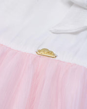 Vestido body en tencel blanco con moñitos y tull plisado rosa para bebé niña