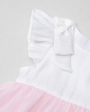 Vestido body en tencel blanco con moñitos y tull plisado rosa para bebé niña