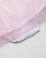 Vestido body en tencel blanco con moñitos y tull plisado rosa para bebé niña