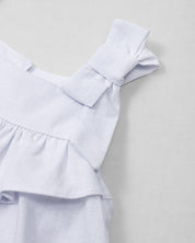 Vestido body en lino blanco con estampado de flores para bebé niña