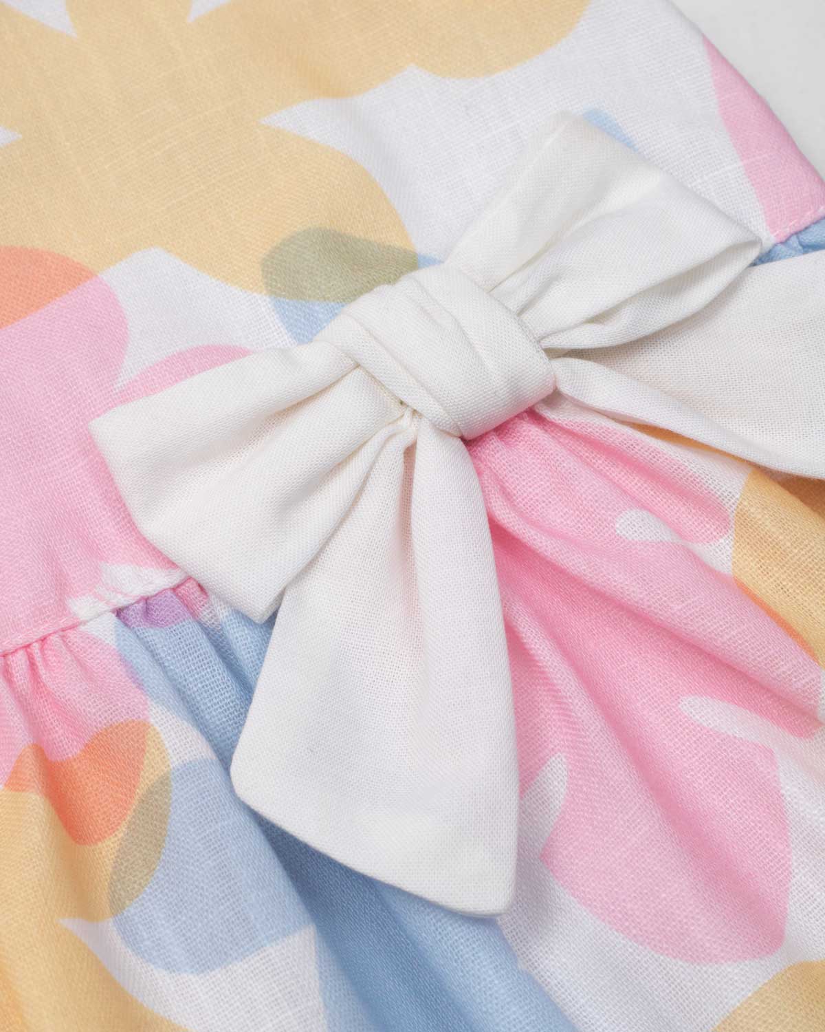 Vestido body con estampado floral pastel con moño blanco para bebé niña