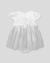 Vestido body con moño blanco satinado y plateado para bebé niña