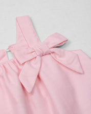 Vestido rosa de tiras con moñito para bebé niña