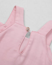 Vestido rosa de tiras con moñito para bebé niña