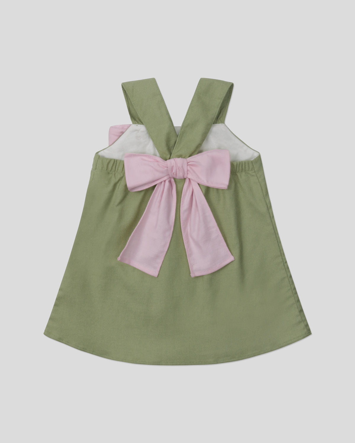 Vestido verde de tiras con moñito rosa para bebé niña