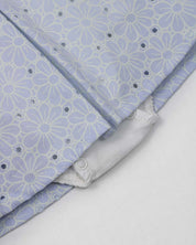 Vestido body en tela hoja rota azul con flores y moñitos para bebé niña