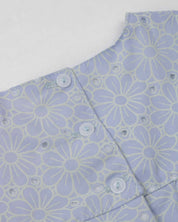 Vestido body en tela hoja rota azul con flores y moñitos para bebé niña