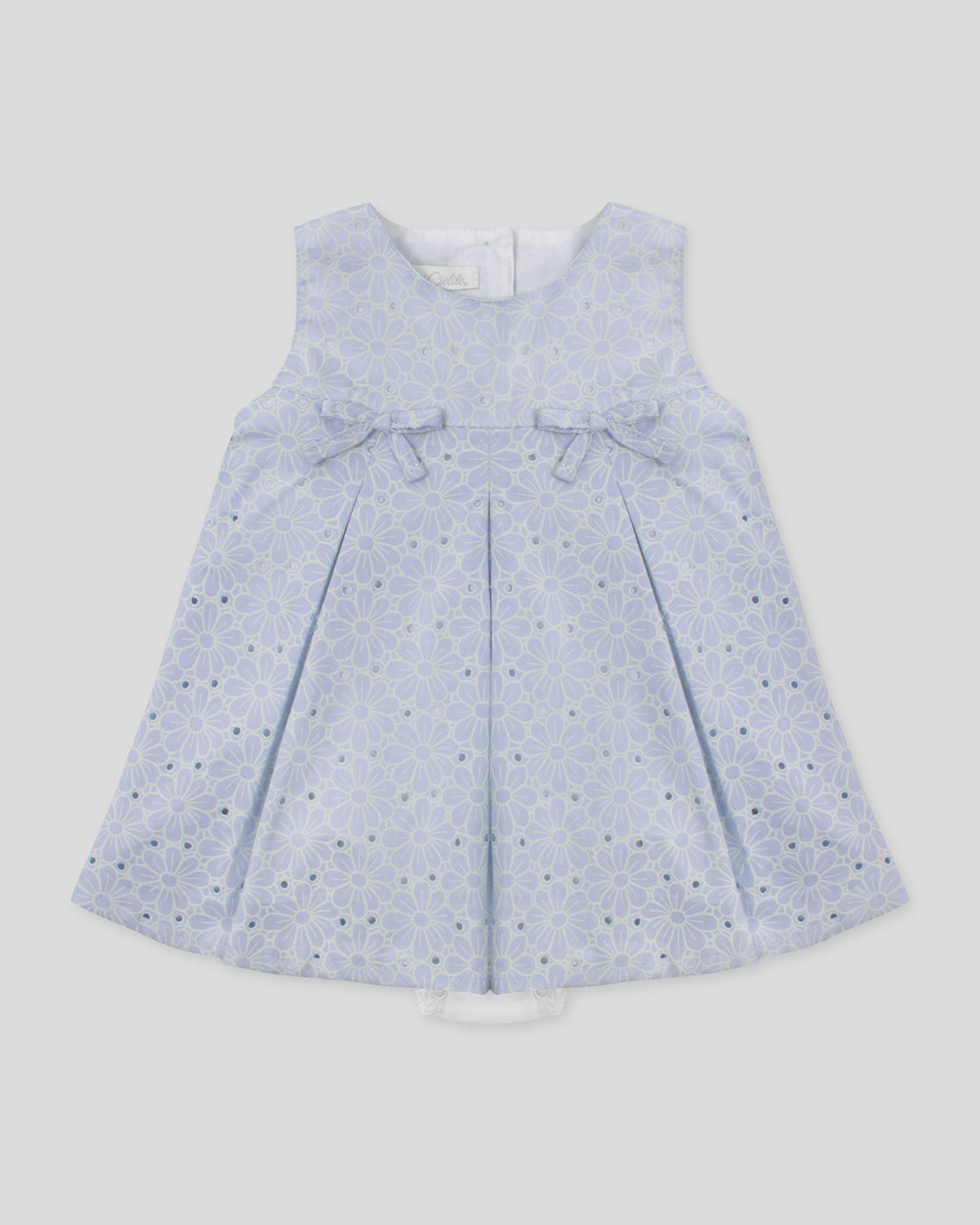 Vestido body en tela hoja rota azul con flores y moñitos para bebé niña