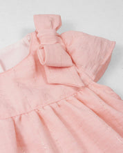 Vestido body rosa con detalle de líneas plateadas y moño en hombro para bebé niña