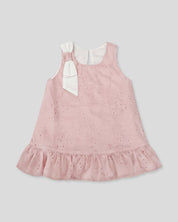 Vestido rosa en tela hoja rota con moño blanco en hombro para bebé niña