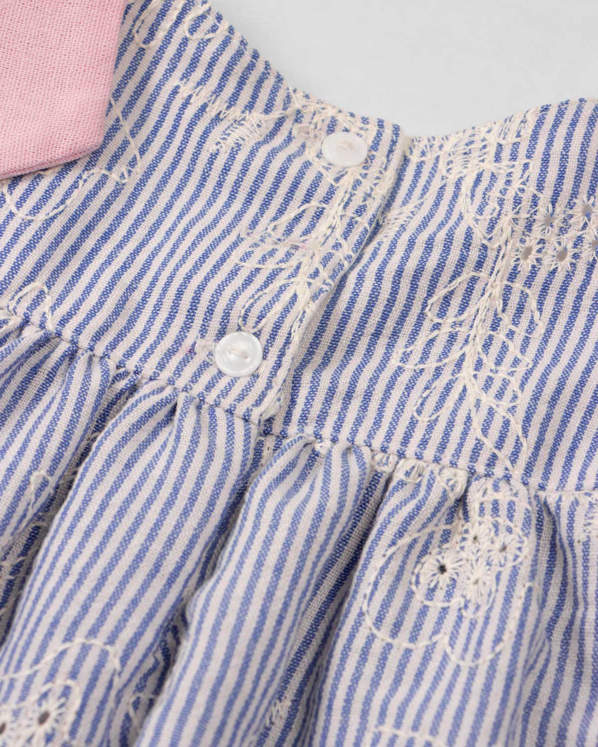 Vestido de rayas azul en tela hoja rota con moño en hombro para bebé niña