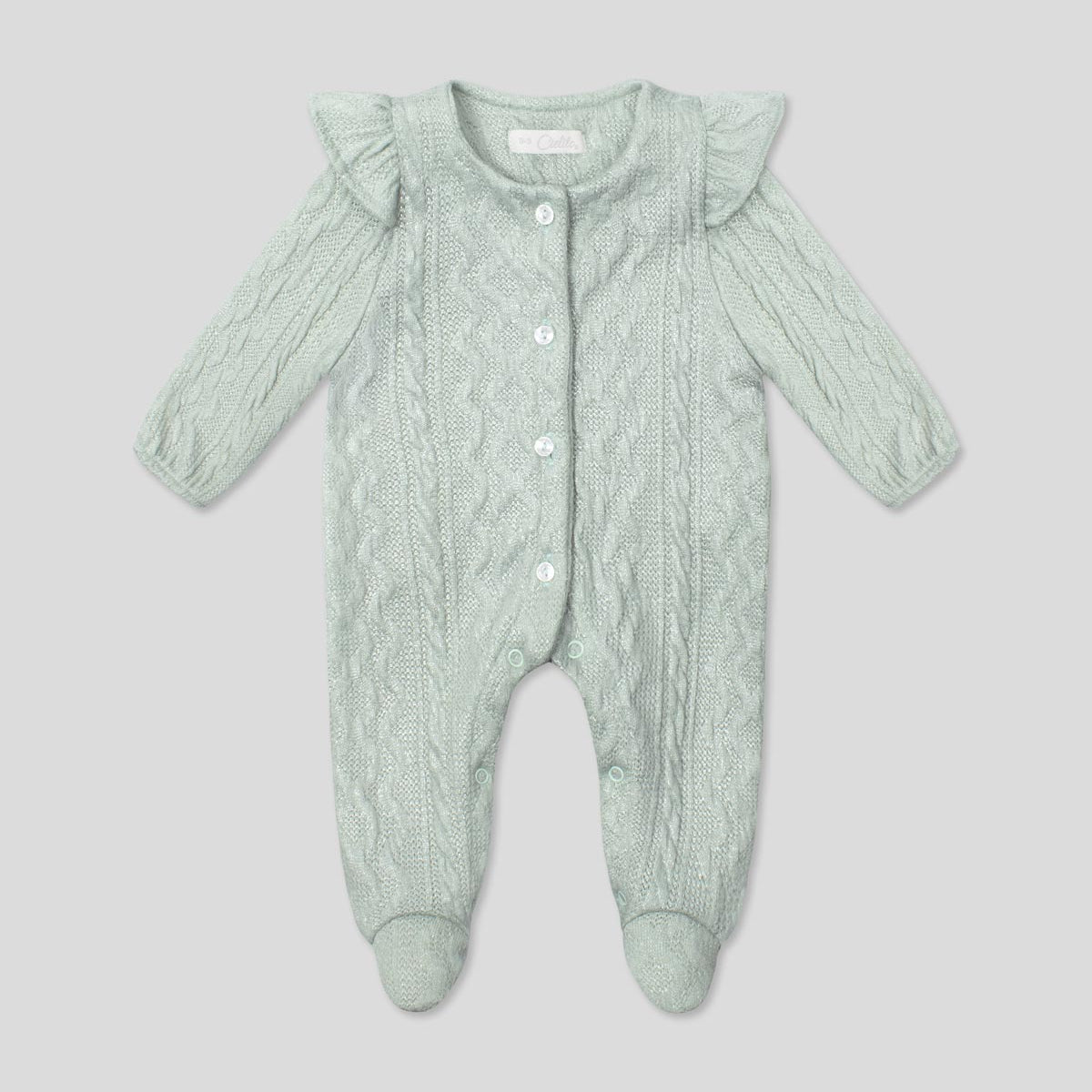 Pijama enteriza en tela tejida verde con botones y boleritos en hombro para bebé niña