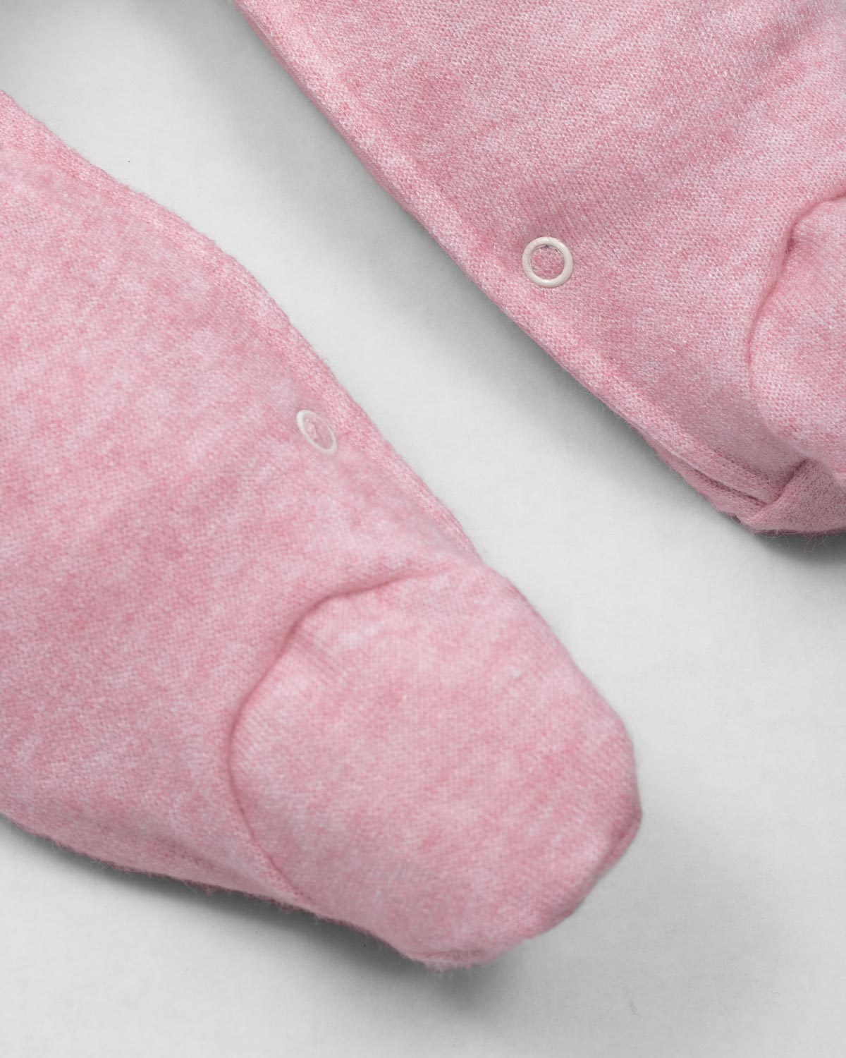 Pijama enteriza rosa con botones y boleros para recién nacida