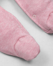 Pijama enteriza rosa con botones y boleros para recién nacida