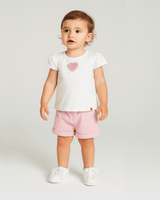 Conjunto camiseta blanca con corazón y short rosa para bebé niña