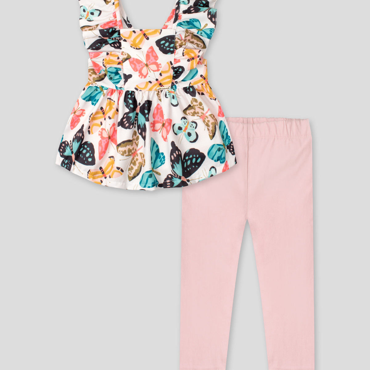 Conjunto blusa estampada de mariposas con bolero en manga, detalle de moño y leggins rosado para niña