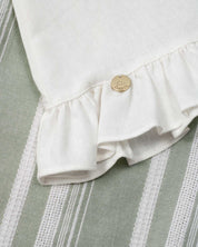 Conjunto blusa blanca de bolero cruzado con moño y pantalón verde en lino para niña