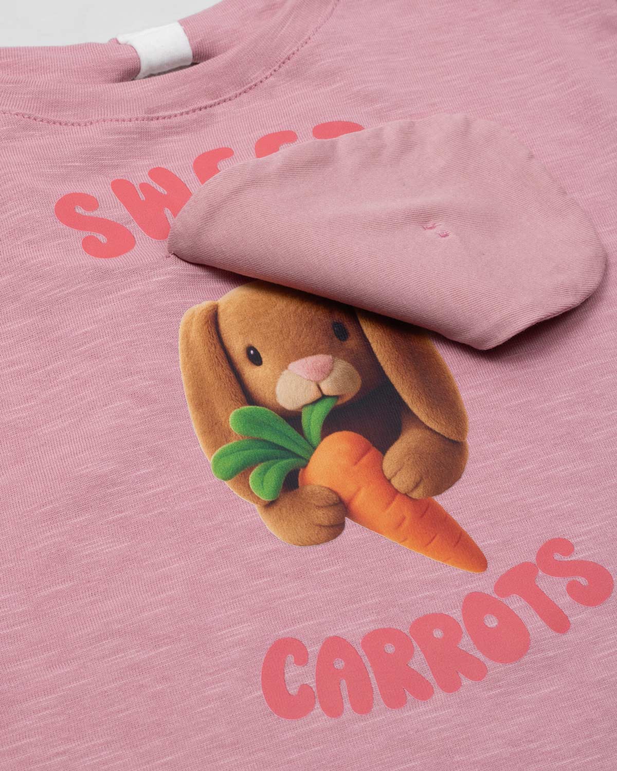 Conjunto blusa rosa con estampado de conejo y short azul para niña