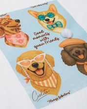 Camiseta blanca con estampado de perritos y short azul con bolsillos para niña