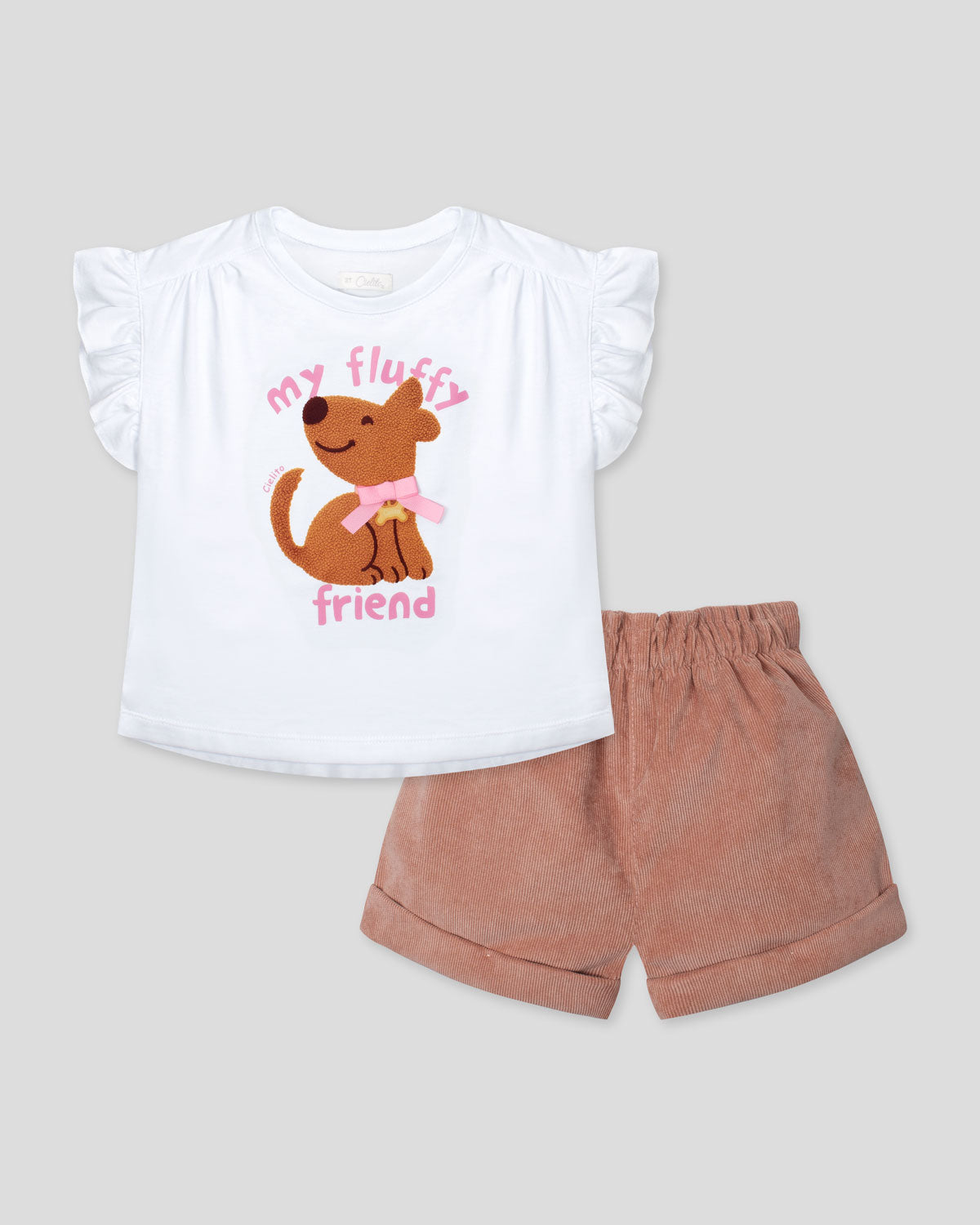 Conjunto blusa blanca con estampado, boleros en manga y short café para niña