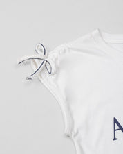 Conjunto con blusa blanca y falda short para niña