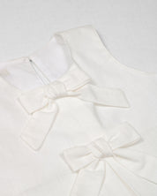 Conjunto blusa blanca con falda short verde para niña