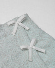 Conjunto blusa blanca con falda short verde para niña