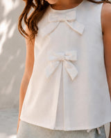 Conjunto blusa blanca con falda short verde para niña