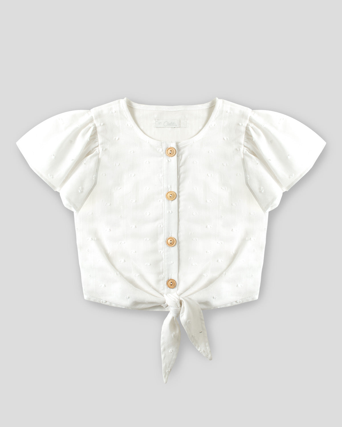 Blusa blanca con boleros y moño para niña