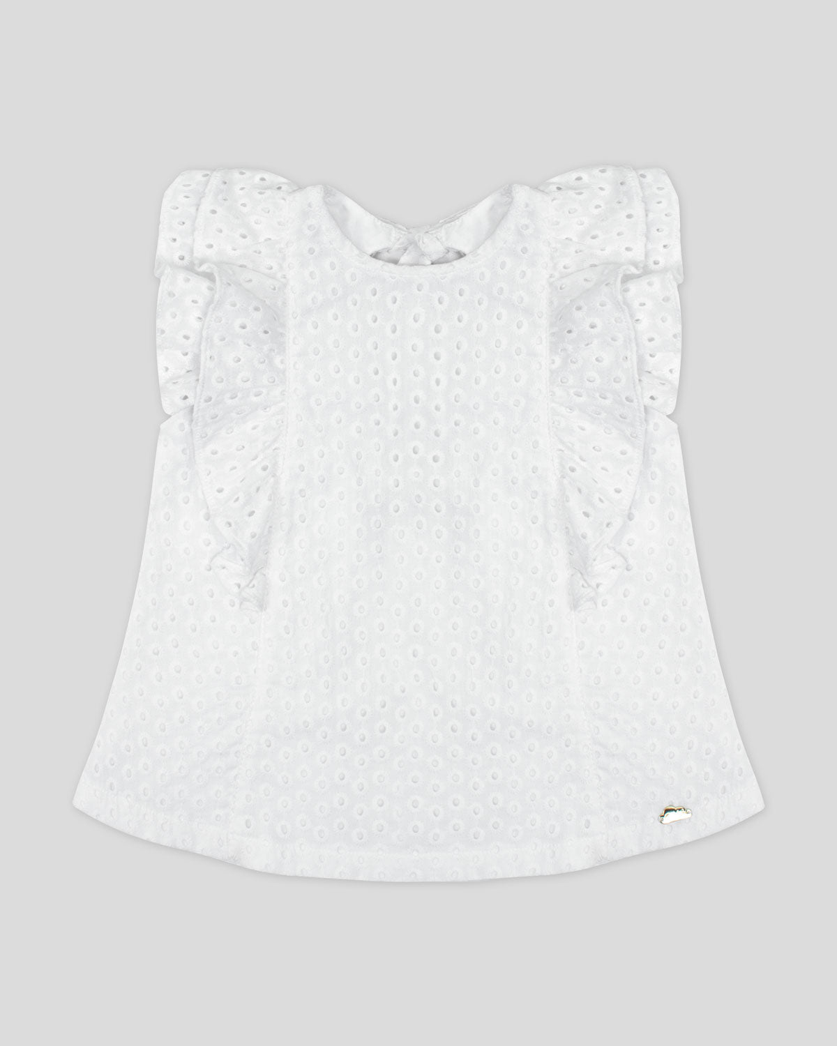 Blusa blanca en tela hoja rota con boleros y moño en espalda para niña