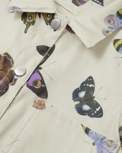 Chaqueta estampada de mariposas con boleros en manga y bolsillos en el frente para niña