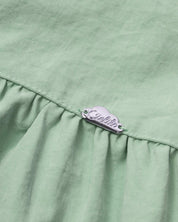 Blusa verde de tiras con boleros para niña