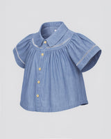 Blusa en chambray con botones para niña