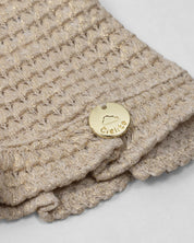 Saco tejido beige con brillos para niña