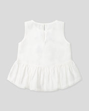 Blusa blanca con moñitos negros y bolero para niña