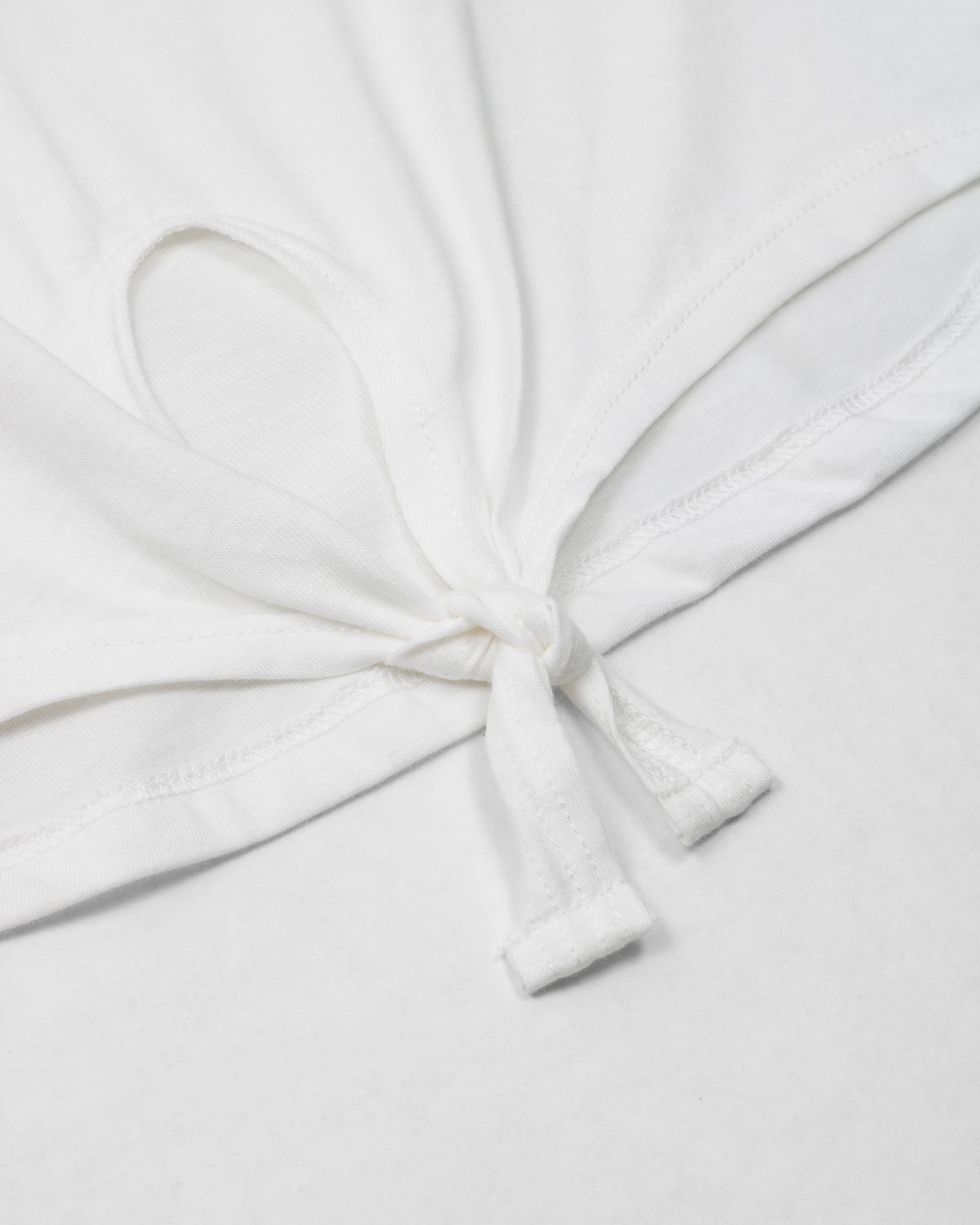 Camiseta amplia blanca con estampado de bolsito para niña