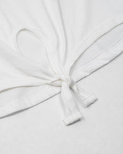 Camiseta amplia blanca con estampado de bolsito para niña