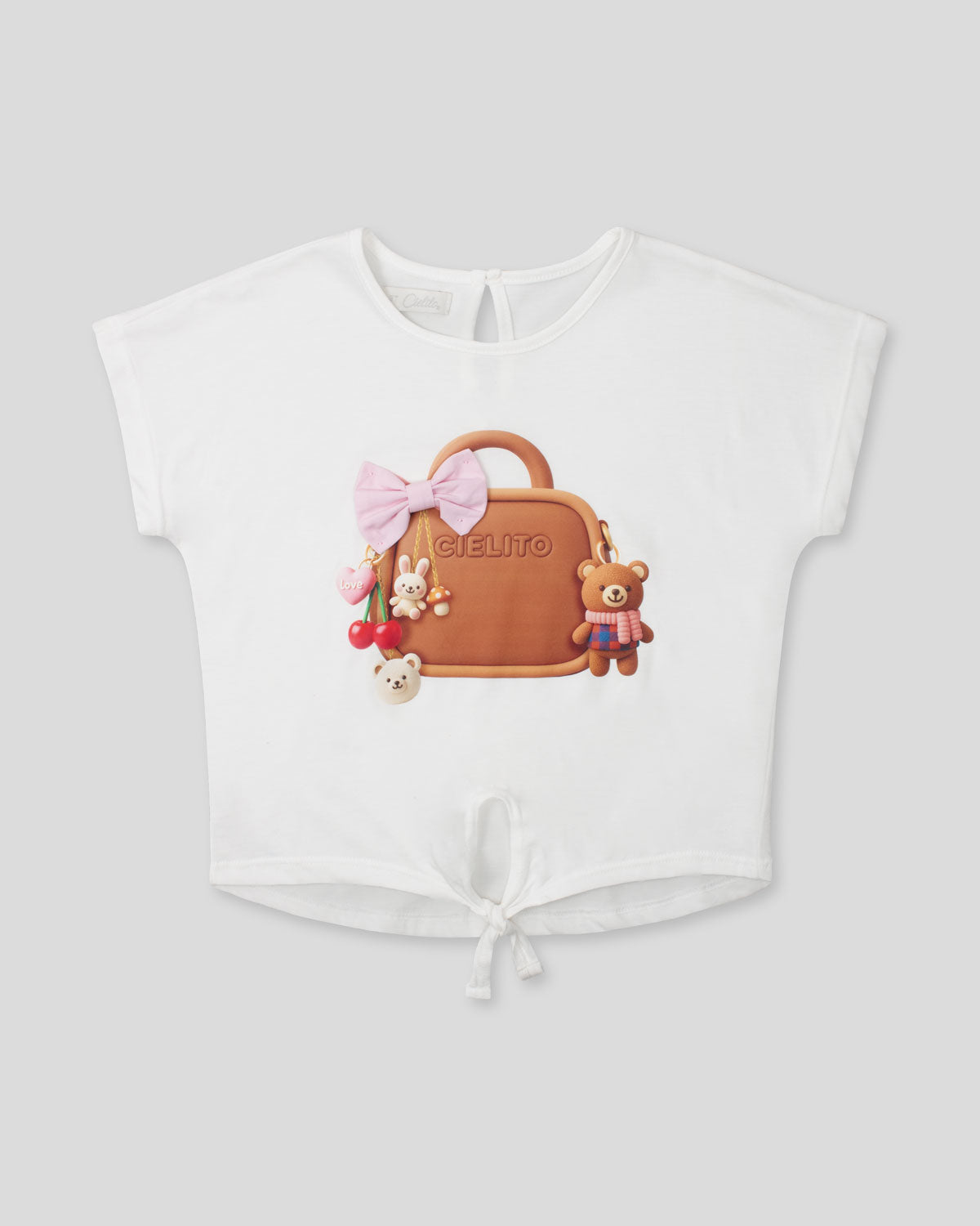 Camiseta amplia blanca con estampado de bolsito para niña