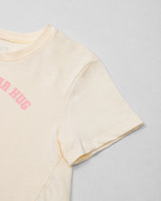 Blusa vainilla con estampado y boleros para niña