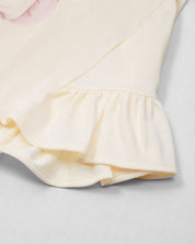 Blusa vainilla con estampado y boleros para niña