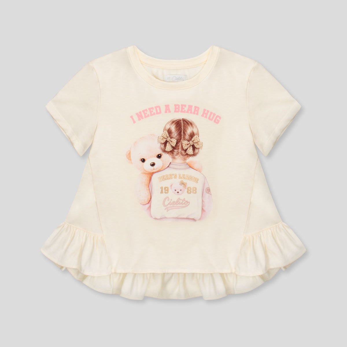 Blusa vainilla con estampado y boleros para niña