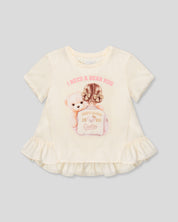 Blusa vainilla con estampado y boleros para niña